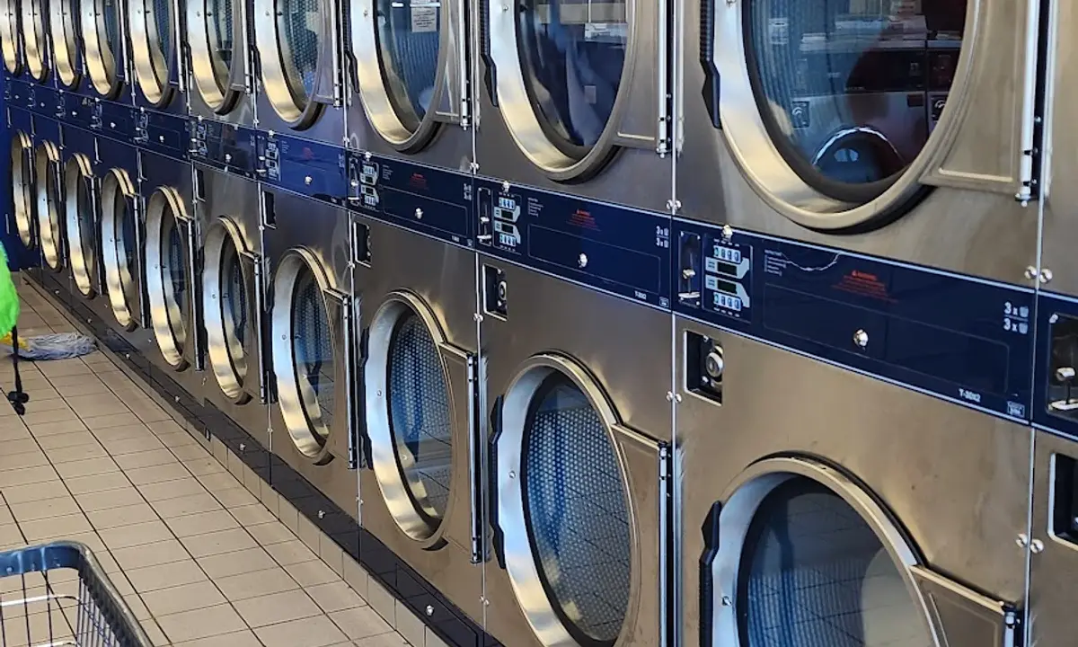 Row of commercial dryers inside Scrub A Dub